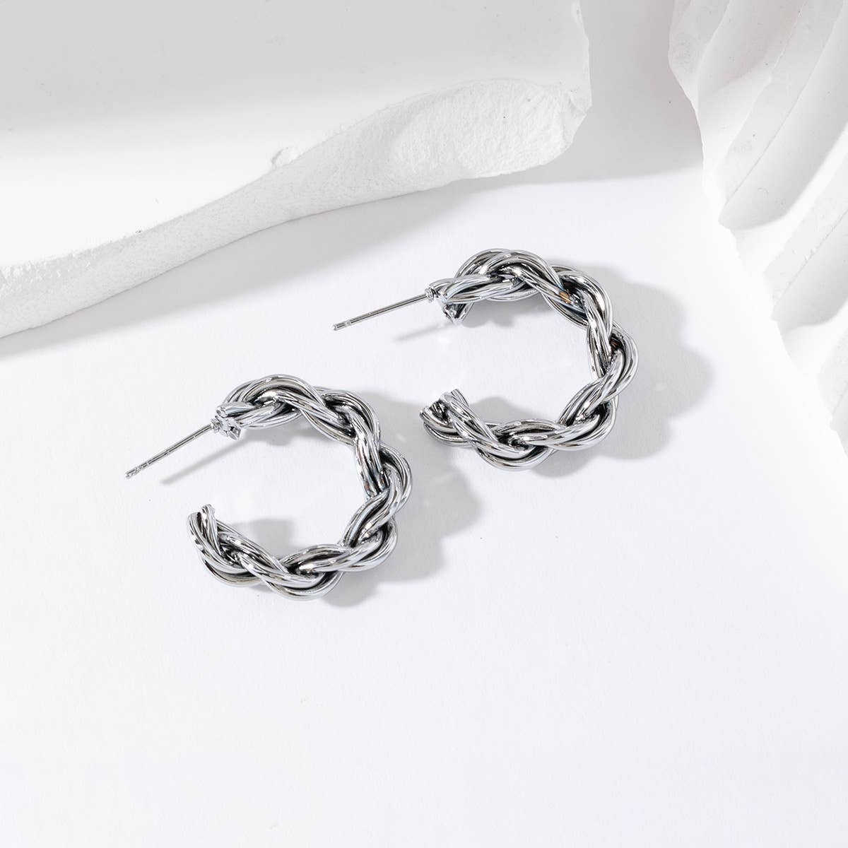 Gevlochten oorringen - Agathe: Zilver