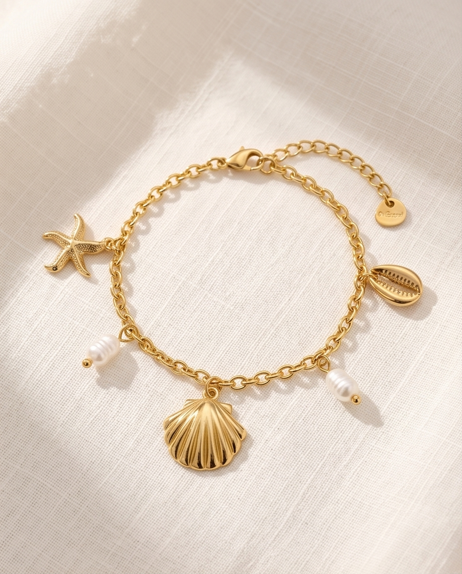 Armband Coco - vergulde schelp & zeester