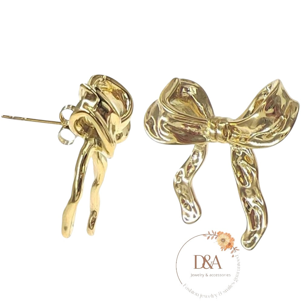 Boucles d'oreilles nœud Gulia: Doré