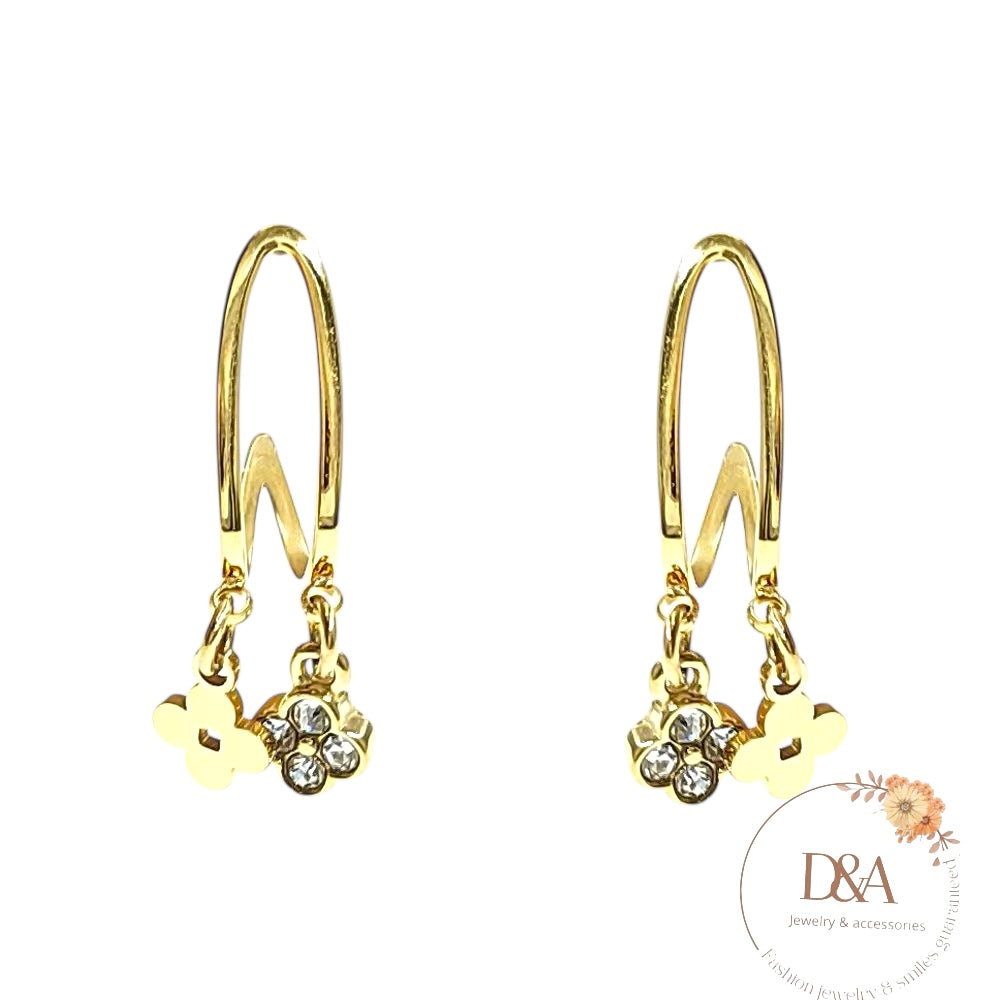 Boucles d'oreilles fleur strass Céline: Doré