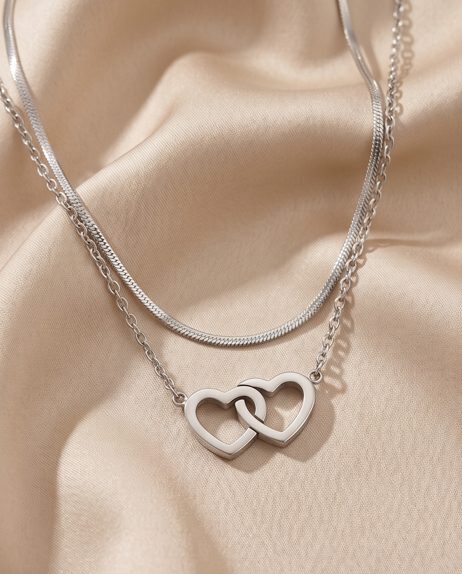 Necklace and bracelet connecting hearts