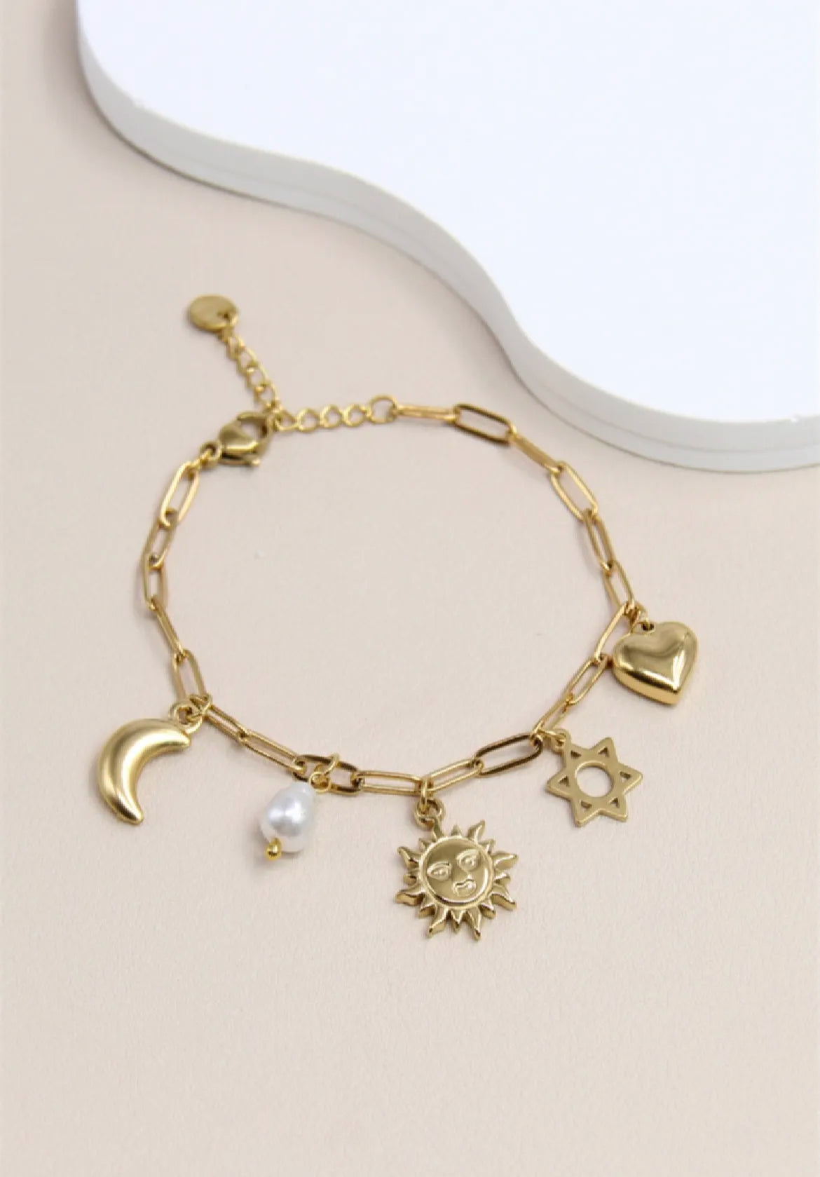 Roestvrijstalen bedelarmband met maan, ster, hart en iriserende parel