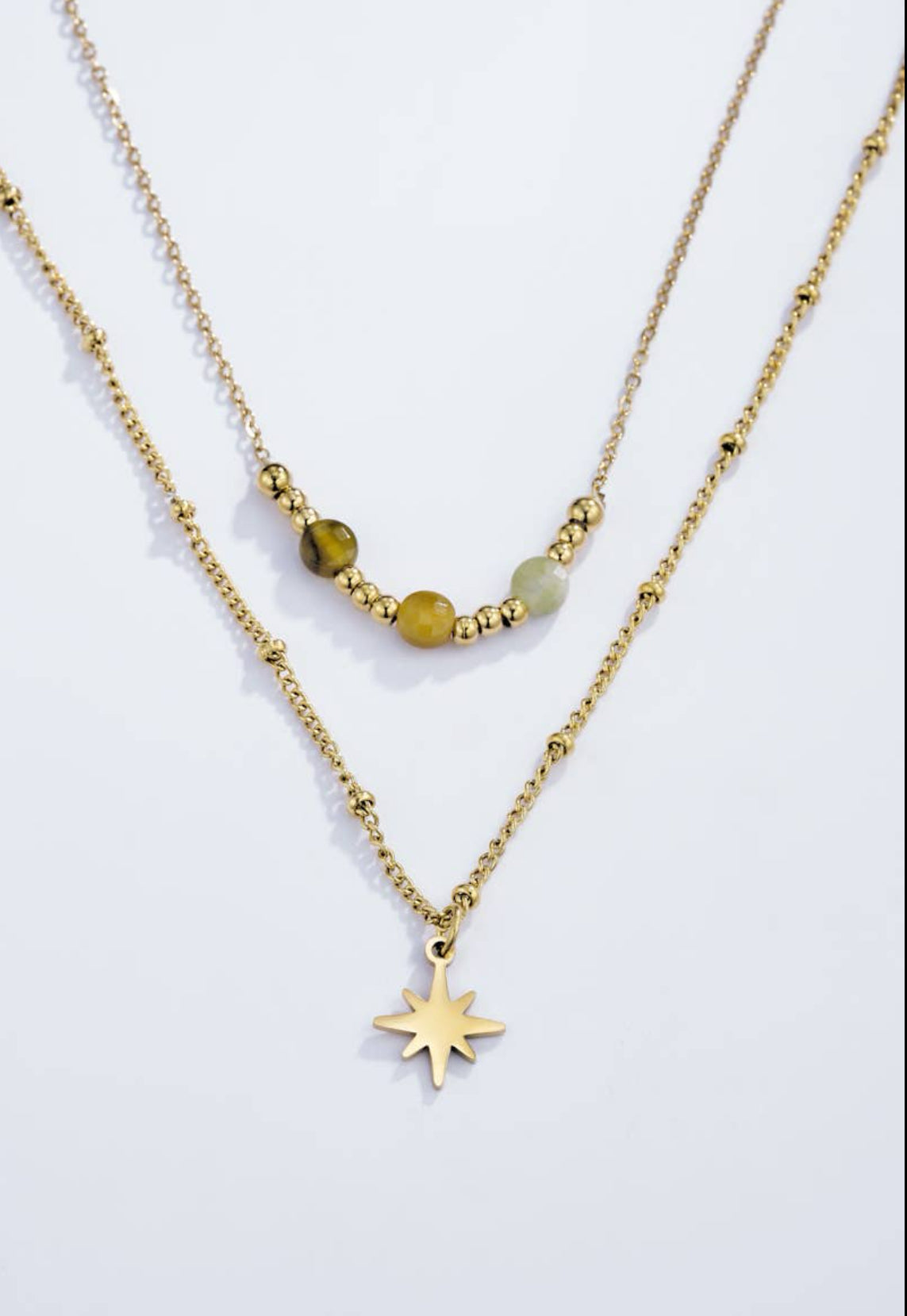 Dubbele ketting met ster in roestvrij staal: Goud