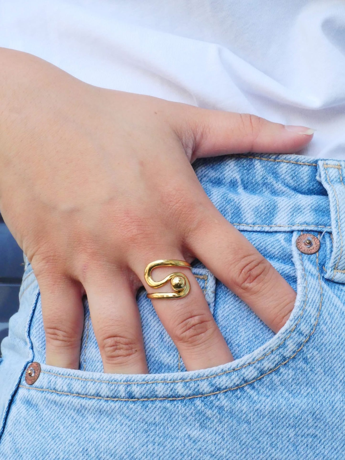 Bague torsadé orné de perle doré
