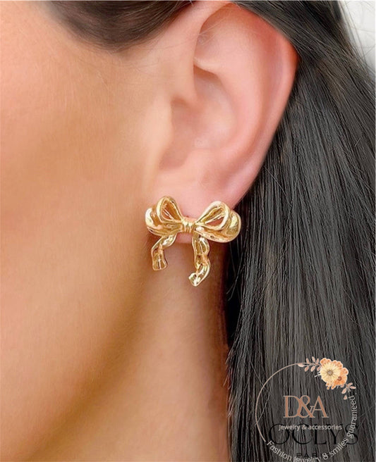 Boucles d'oreilles nœud Gulia: Doré