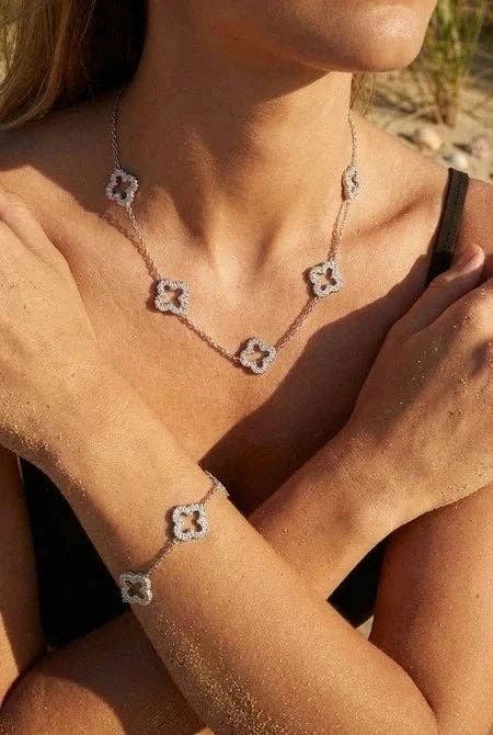 Set sprankelende klavertjes van roestvrij staal (halsketting & armband) – Goud- of zilverkleurig