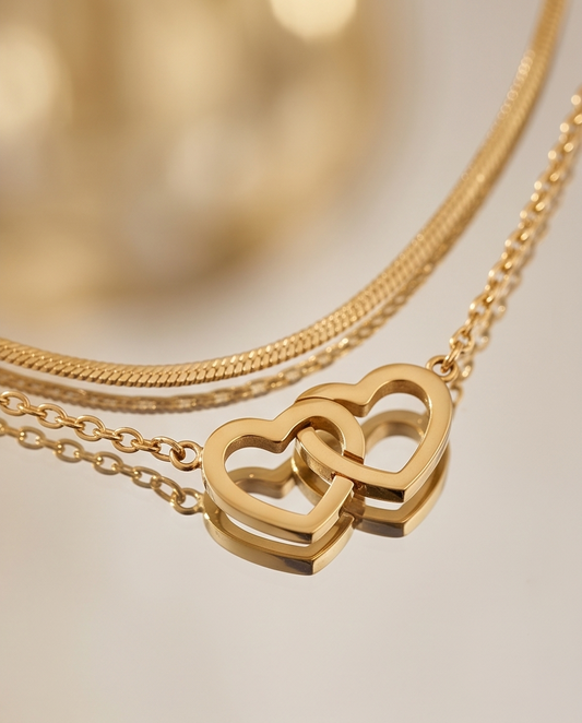 Necklace and bracelet connecting hearts