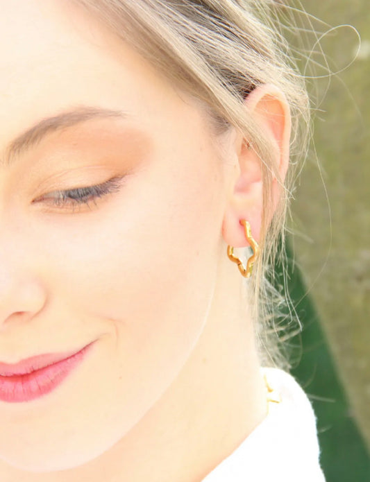 Boucle d'oreille étoile: doré