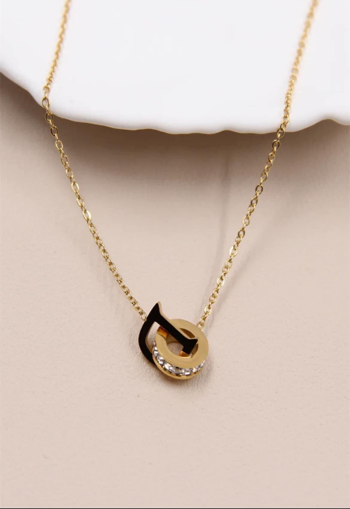 "D" ring necklace decorated with rhinestones